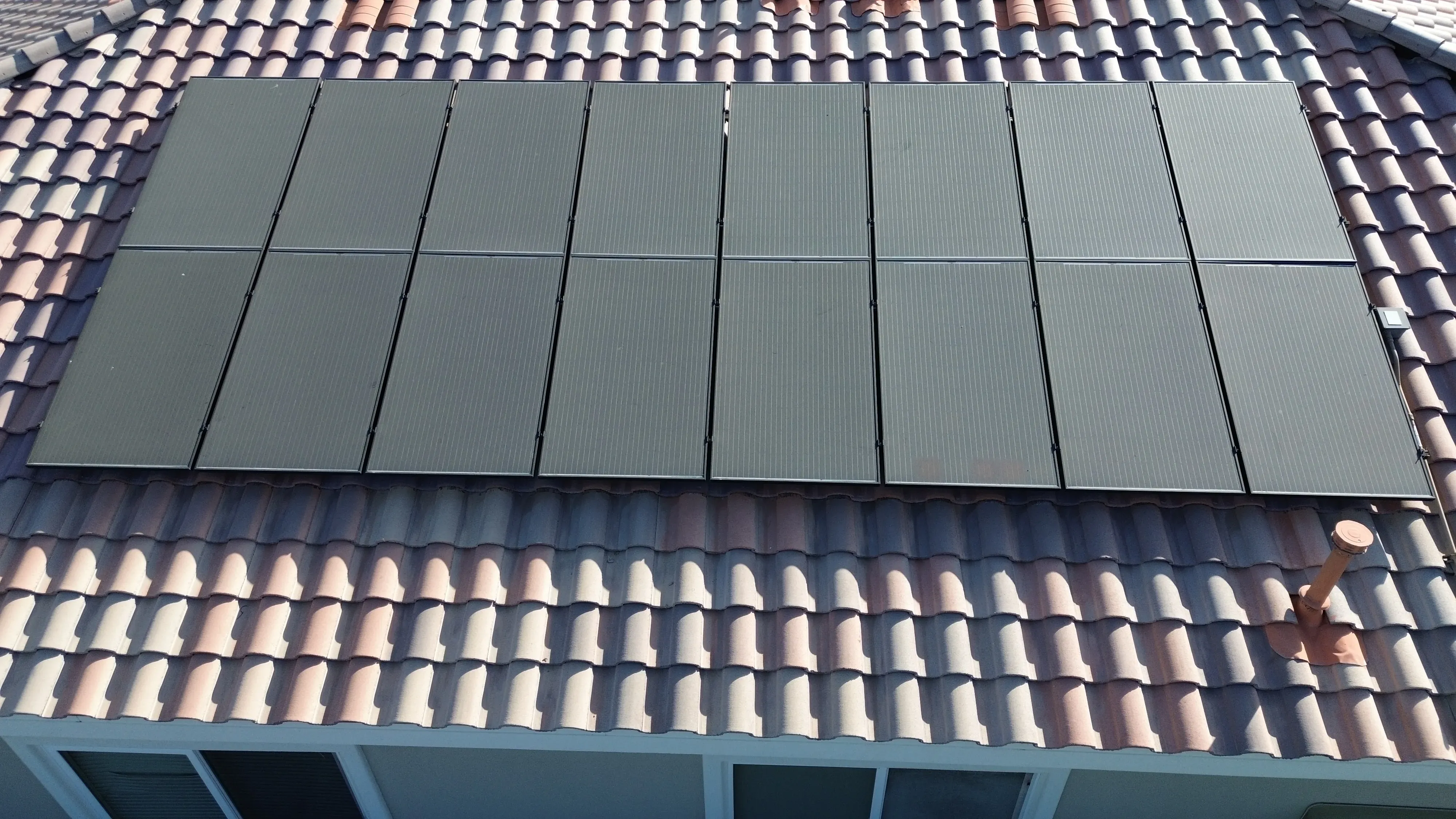 Close-up of clean solar panel glass after a drone cleaning pass